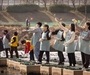코웨이, 안양천에서 EM 흙공 봉사활동 펼쳐